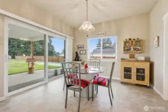 Windows on the end of the kitchen space too- plenty of natural light!