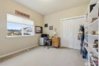 Second bedroom currently used as an office.  Wonderful built in  bookshelves!