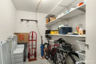 This huge storage unit is  RIGHT outside the unit's front door. So convenient! And just one of MANY storage areas for this condo. There are 7 closets in the unit in addition to this storage room, plus a storage shed on the 2nd patio.