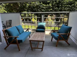 You almost never see a patio this large in a condo. This is only half of the patio. This portion is mostly covered. You can enjoy gardening, grilling or just relax with a cup of coffee.