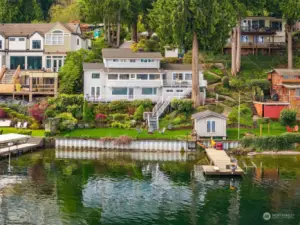 House and private dock with boathouse.