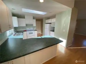 There’s storage under the bottom left of this counter accessible from this dining room area.