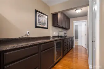 Wet Bar with so many storage cabinets.