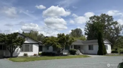 Nestled on 2 scenic acres in the Big Lake area, this stunning custom home offers a fantastic mix of income potential and modern amenities. I can picture you or someone you know enjoying this beautiful home and acreage.