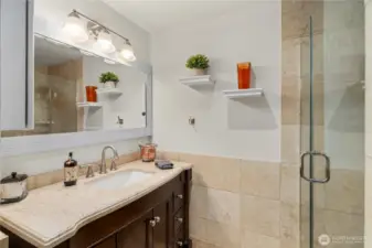 Bath adjacent to junior primary suite