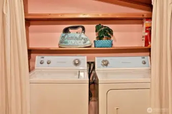 A bit more storage above your washer & dryer.