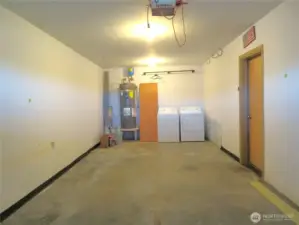 THE SINGLE CAR GARAGE DOUBLES AS A LAUNDRY ROOM AND OPENS INTO THE ENTERTAINMENT AREA!
