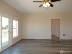 VIEW OF THE LIVING AREA TOWARD PRIMARY BEDROOM!