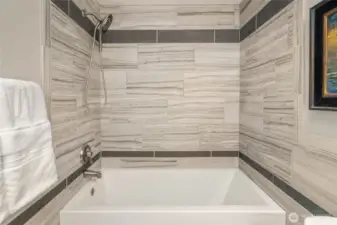beautiful tile completes this amazing bathroom