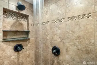 Primary 3/4 bathroom with skylight and heated floor