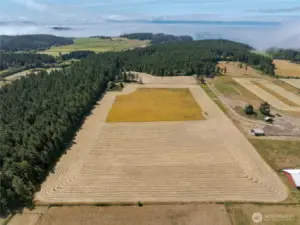 Pasture in the midst of hay making.