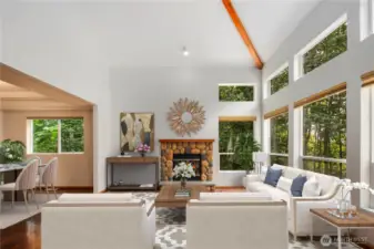 Living Room w/ Fireplace & High-Vaulted Ceilings