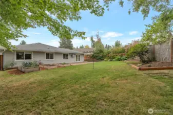 Large fenced back yard, close to a park