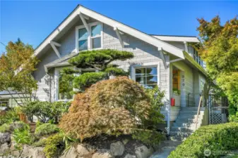 Welcome home to 3702 SW Cloverdale St - A lovely 1916 Craftsman home sited on a generous corner lot in the Gatewood neighborhood of West Seattle.
