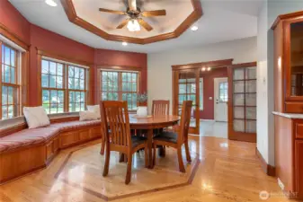 This inviting culinary space opens to an additional dining area