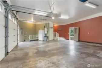 Large 2+ car garage with access to 1061 partially finished basement space