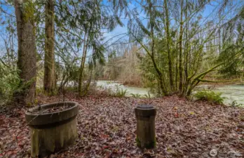 Fire pits next to the river