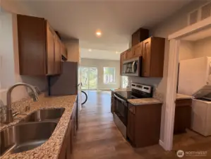 GRANITE COUNTERS, LIKE NEW CABINETRY AND APPLIANCES