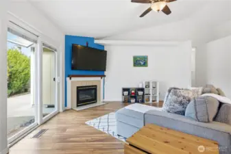 Cozy up by the fireplace or step outside to your bright and sunny patio