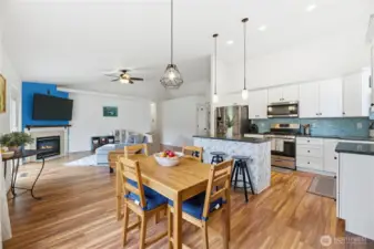 Open concept kitchen, dining and living room