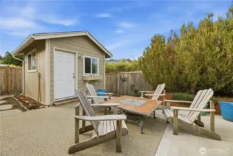 Step outside to your patio and enjoy the sunshine and privacy.  That shed has electric and heat.