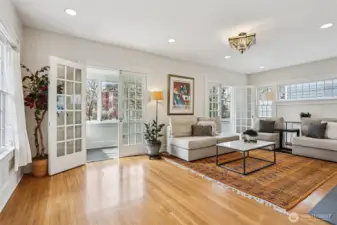 Living room opens to sun porch.