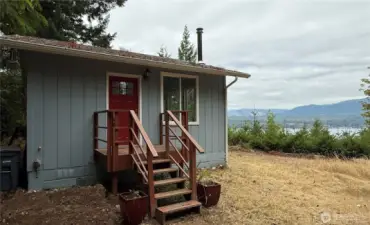 Front entry, deck around the side