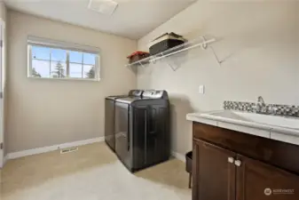 Large Laundry upstairs with sink. washer and dryer included