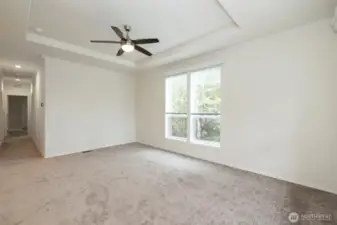 9-10’ ceilings with built-in coffers, ceiling crown molding and full base trim
