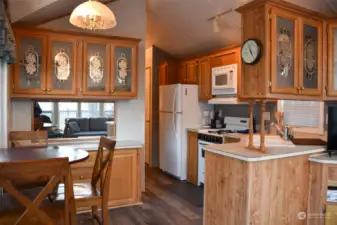 Warm kitchen with an abundance of storage. All appliances stay.