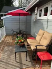 Charming porch just a step away from the living area on the main level