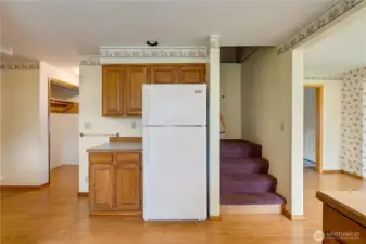 Upstairs there are two additional bedrooms.