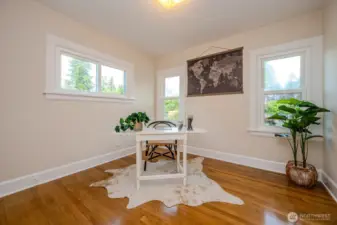 Bedroom #2 is staged as an office but also features a sizable walk-in closet with built-ins. This room also features wonderful views of the pretty backyard.
