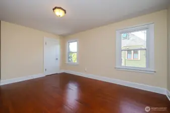 To the right of the Studio is Bedroom #3. Spacious and beautiful, this room also boasts a large walk-in closet.