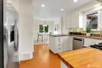 Remodeled Kitchen Shows Granite Counters, A Full Set of Stainless Steel Appliances & Spacious Breakfast Nook!