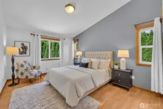 Primary bedroom is an oasis of space, light and calm