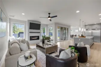 Seamless flow from living room to kitchen and dining areas.