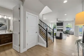 Half bath and coat closet.