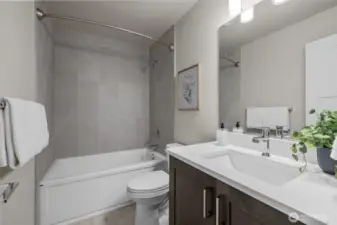 Junior suite bath with soaking tub and upgraded finishes.