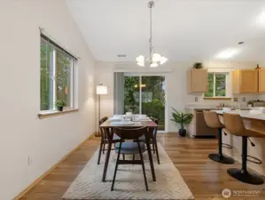 Dining area with view of green belt outside