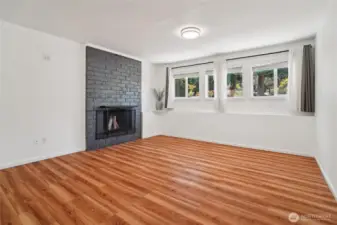 Recroom downstairs  with fireplace.