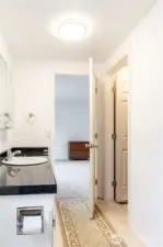 Large primary bathroom with walk-in closet