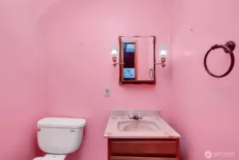 Primary bedroom's half bath