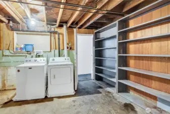 Laundry area with access to the two lower bedrooms, separated by a 3/4 bath