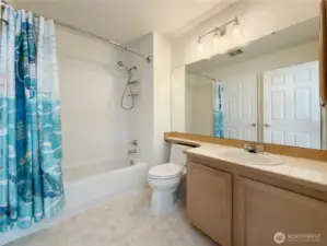 En suite to upstairs Primary Bedroom accessible with 2 entrances