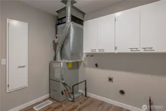 Utility Room washer and dryer are being stored in the garage.