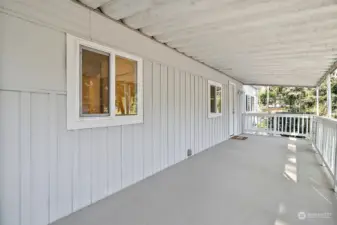 Second view of the covered entry porch.  Plenty of space to relax and entertain.