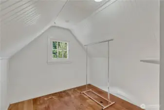 Walk in storage space with window overlooking creek