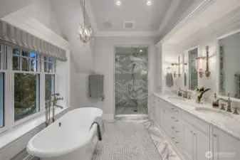 This spa bath is award winning quality. Gorgeous designer lighting, intricate tile and stone, waterworks, heated floors and incredible casework make this primary bath a show piece that you will love to wake up to.