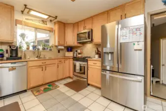 Extraordinary planned kitchen with the fridge, sink, stove triangle.